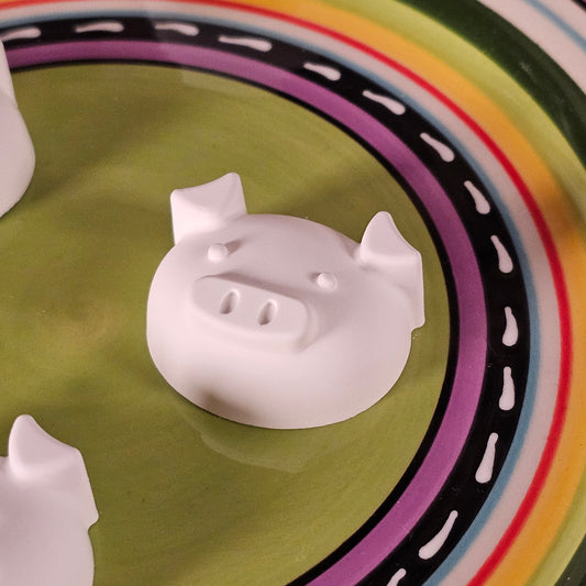 Silikonform: Kleine Schweinchenköpfe, 16er Form