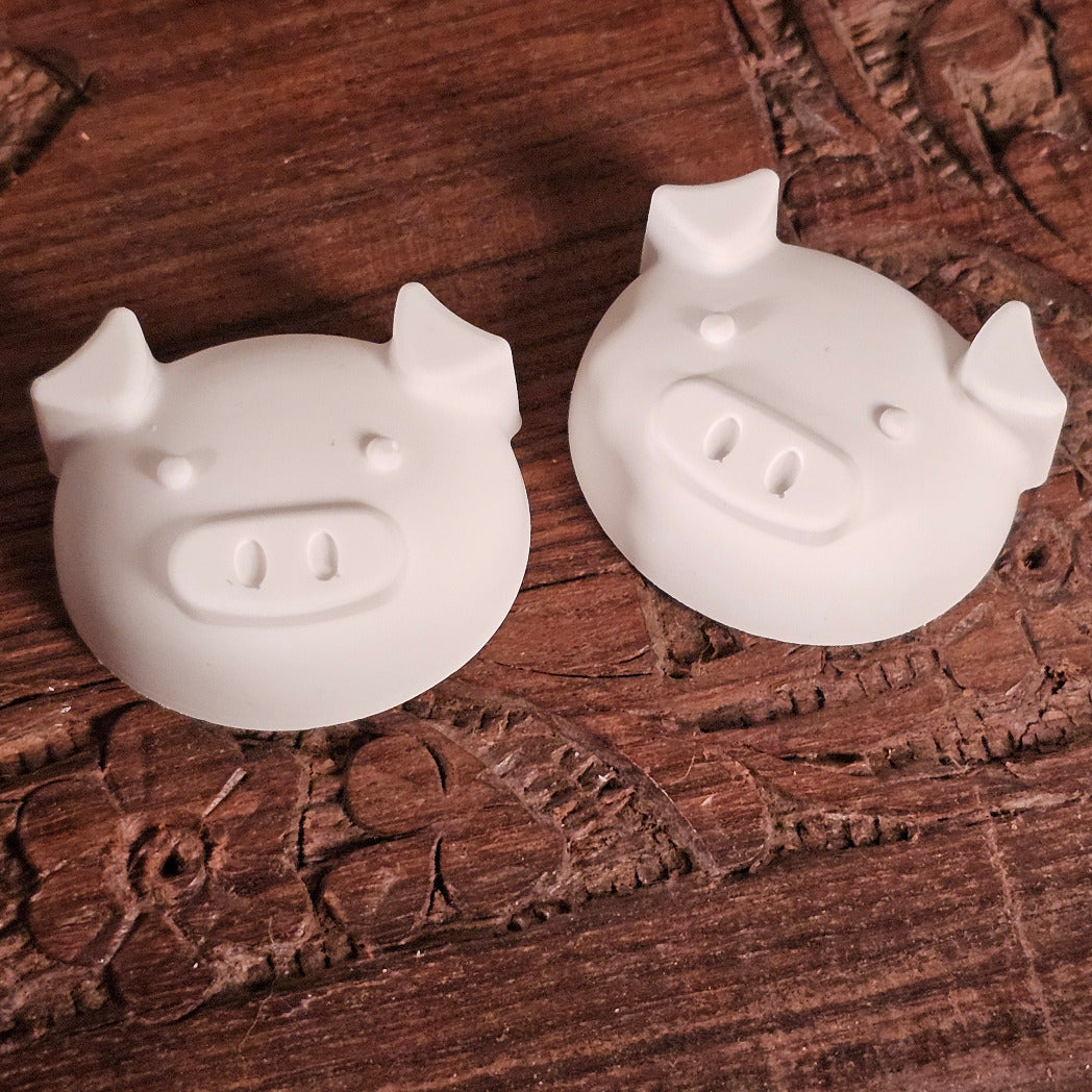 Silikonform: Kleine Schweinchenköpfe, 16er Form